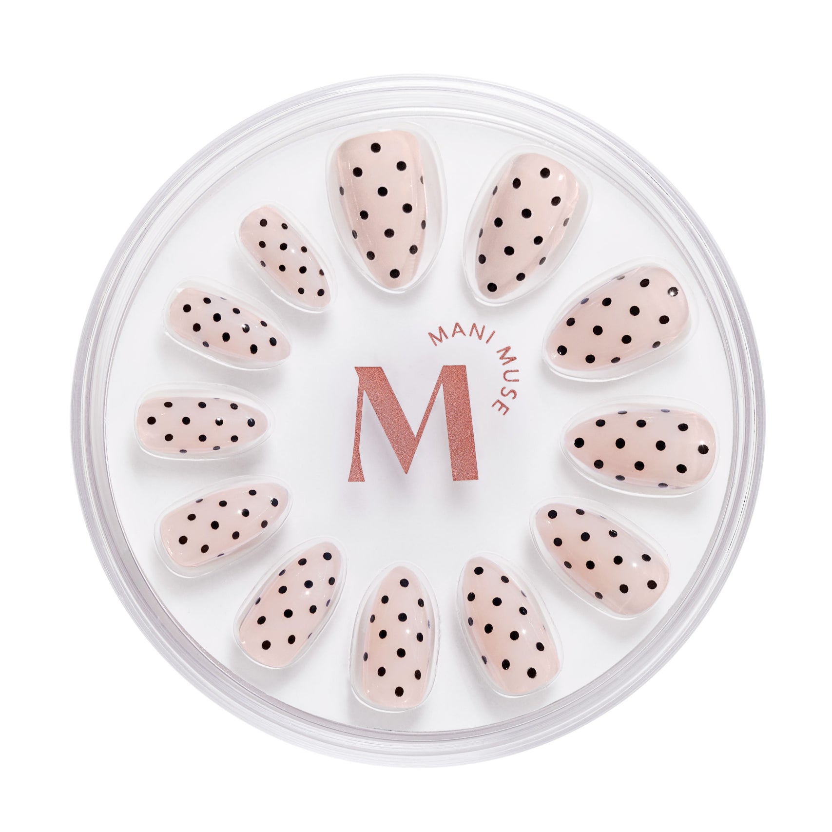 Spotted Past Midnight nude press-on nails with black dots by Mani Muse, on white background.