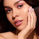 Strawberry Glazed, Ain't Phased strawberry pink glazed press-on nails by Mani Muse, worn by a model (beauty shot).