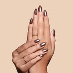 You Choco-alot chocolate brown glazed press-on nails by Mani Muse, close-up hand shot.