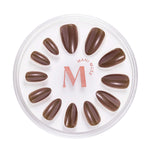 You Choco-alot chocolate brown glazed press-on nails by Mani Muse, on white background.