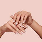 Glazed french manicure press on nails on hand model