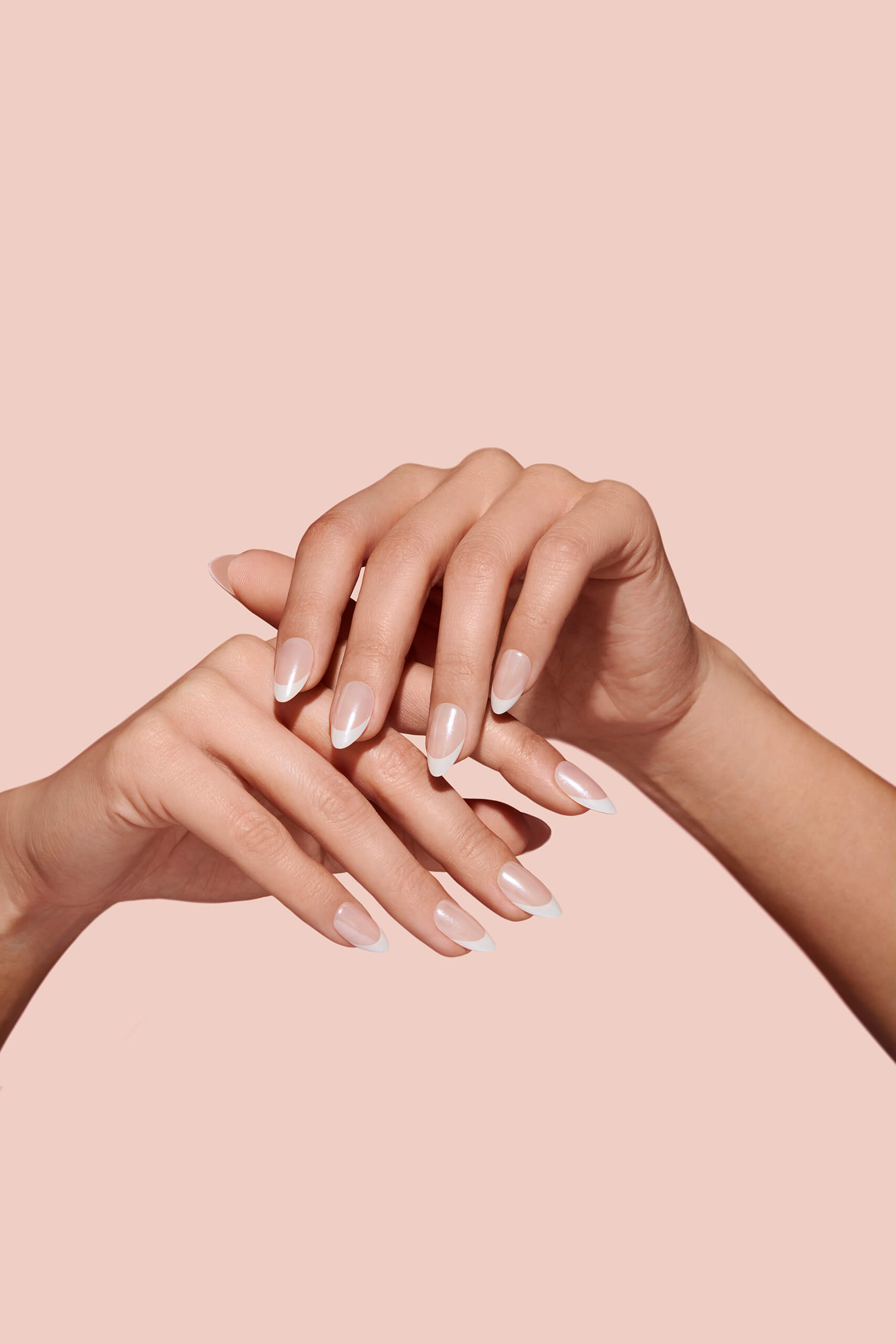 Glazed french manicure press on nails on hand model