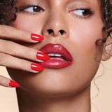 Caught Red Handed red almond press-on nails by Mani Muse, close-up on model.