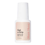 Get a Grip nail glue by Mani Muse on white background. Ultra-strong brush-on adhesive for press-on nails and nail art.