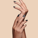 Midnight Night Cap black with pearl gloss press-on nails by Mani Muse, close-up hand shot.
