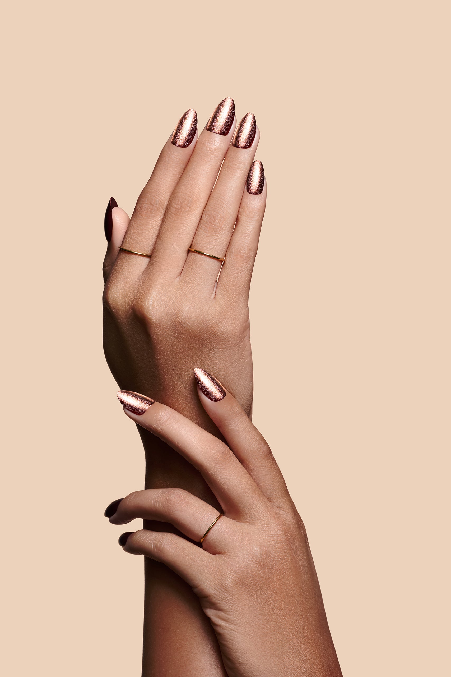 Nail Flex 'N Chill bronze cat-eye press-on nails by Mani Muse, close-up hand shot.