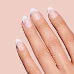 Nice Ice Baby pearls, rhinestones, grommets nail art stickers by Mani Muse, close-up hand shot.