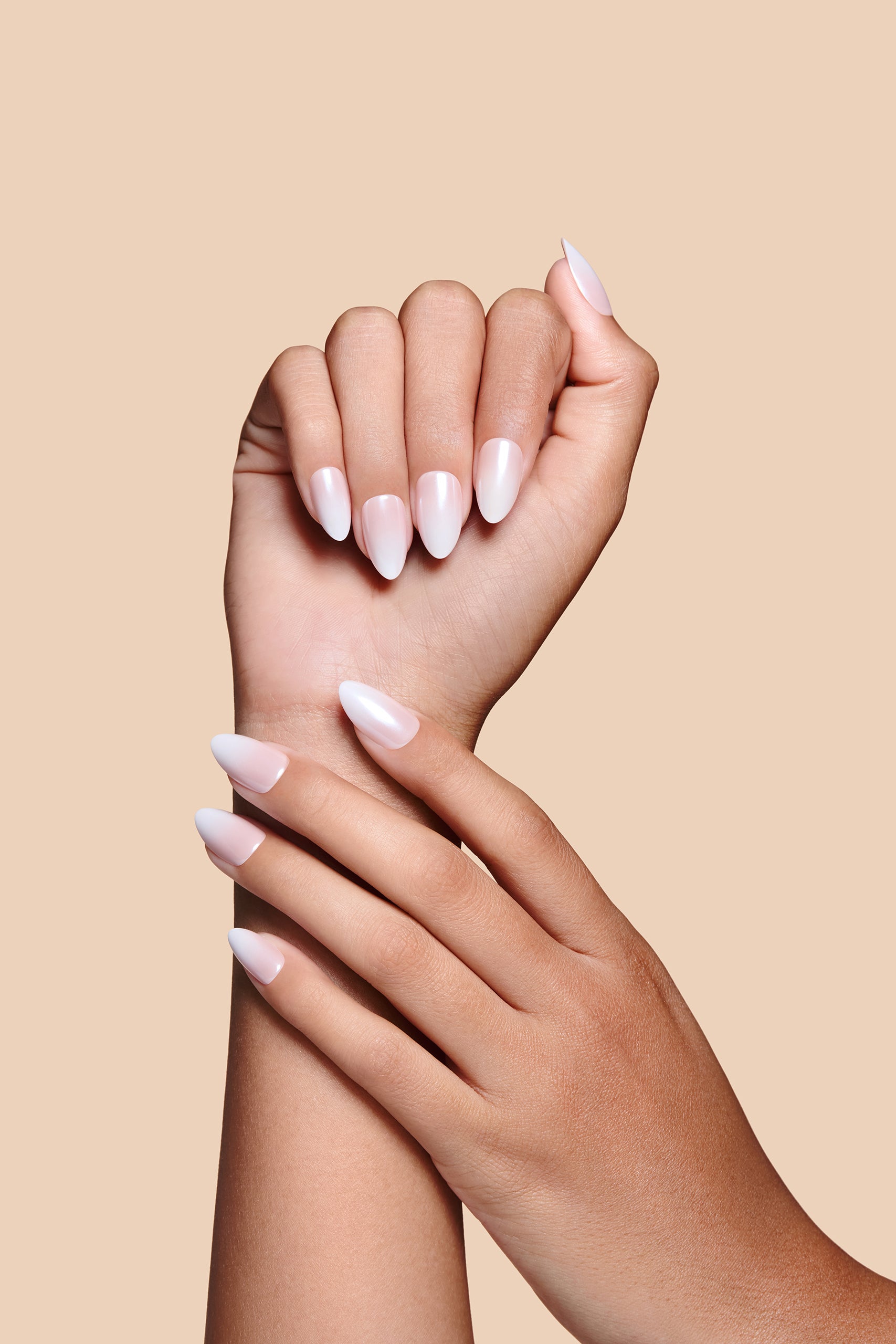 Socially Veri-Fly glazed ombre french press-on nails by Mani Muse, close-up hand shot.
