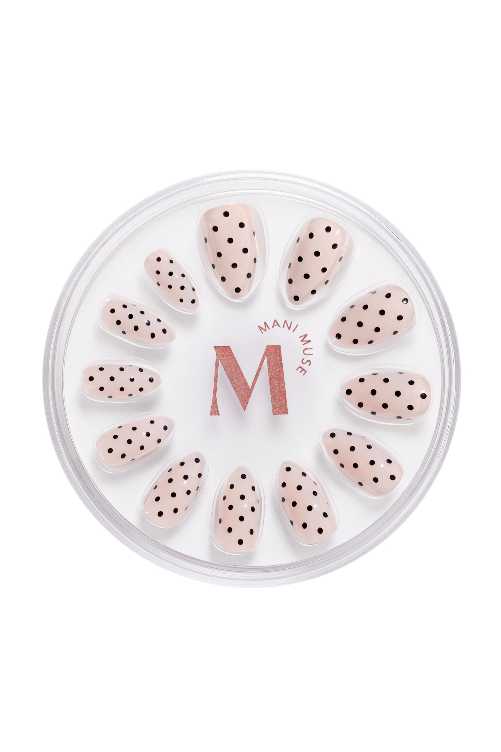 Spotted Past Midnight nude press-on nails with black dots by Mani Muse, on white background.