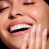 You Drive Glazy glazed french press-on nails by Mani Muse, close-up on model.