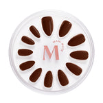 Your Favorite Freddo chocolate press-on nails by Mani Muse, on white background.